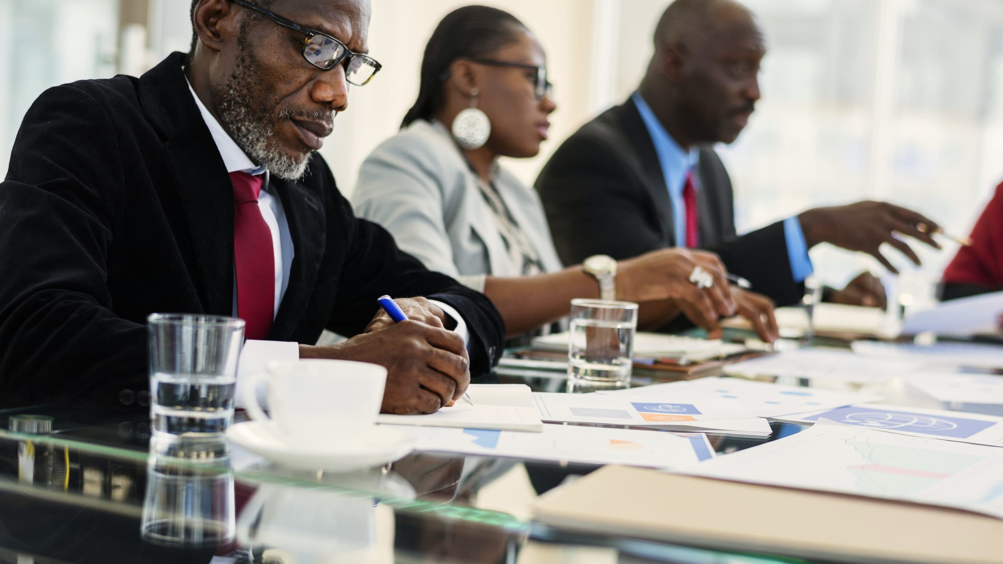 Aigle advisors speaking with clients
